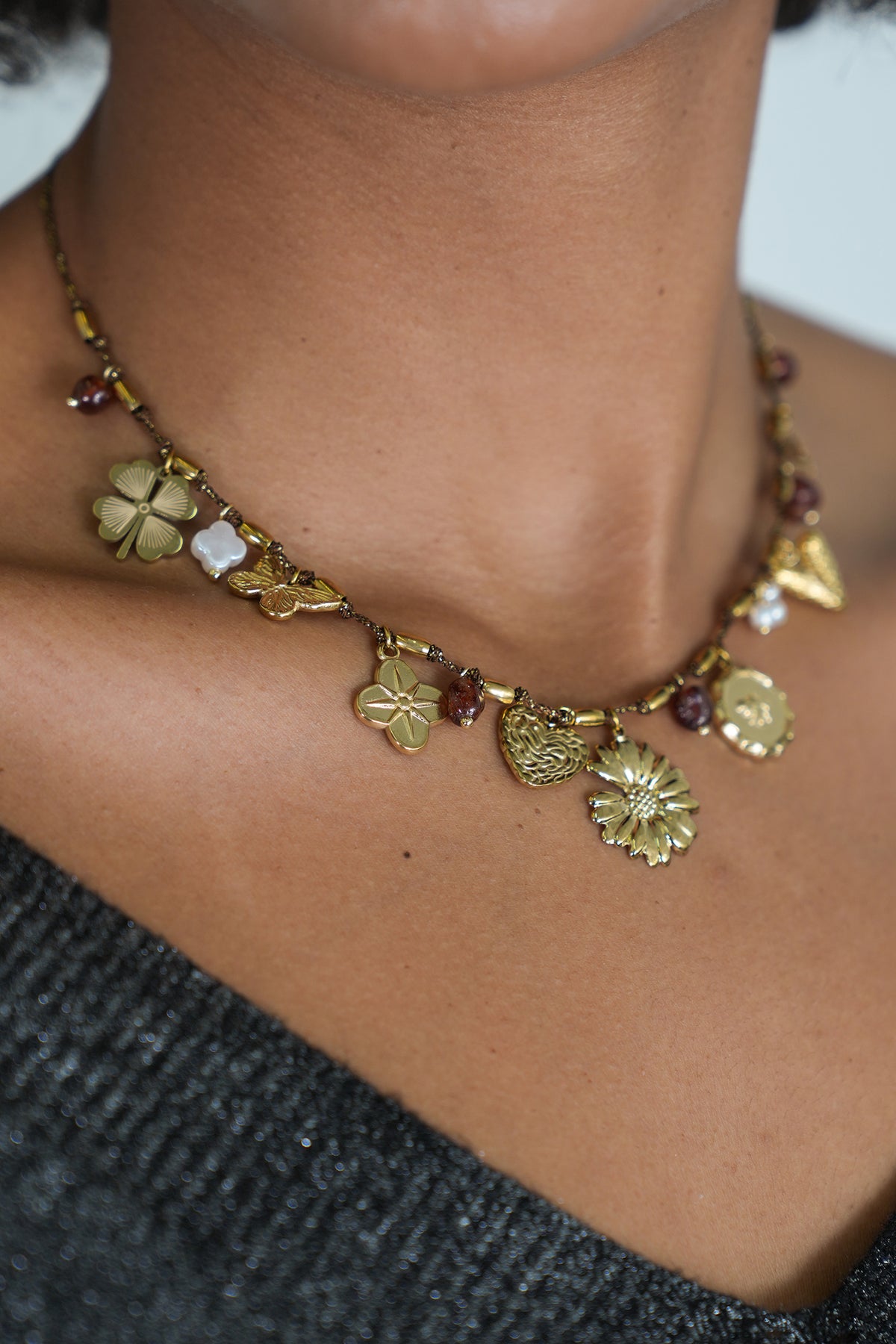 Rust Daisy Charm Necklace, a necklace from Something Pretty