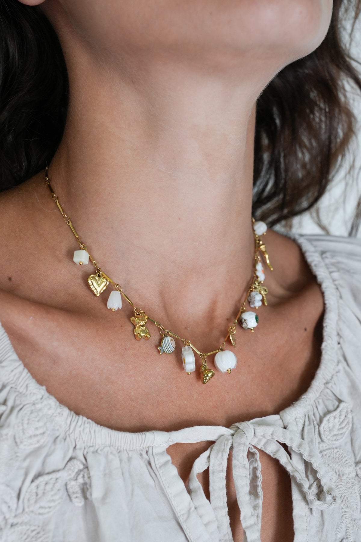 White Daisy Charm Necklace, necklace from Something Pretty, alternative view