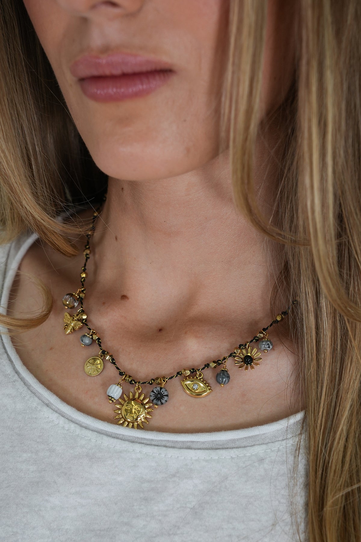 Grey Sunflower Charm Necklace, a necklace from Something Pretty
