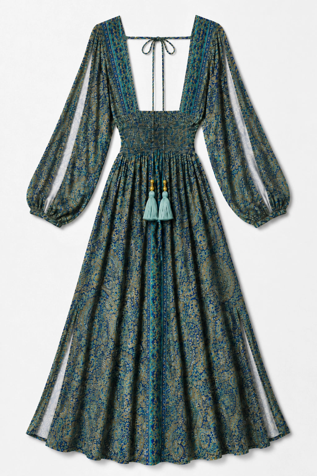 A long-sleeved bohemian-style maxi dress with a square neckline, tie-front detail, and tassel accents, featuring a blue and green paisley pattern on a light background.