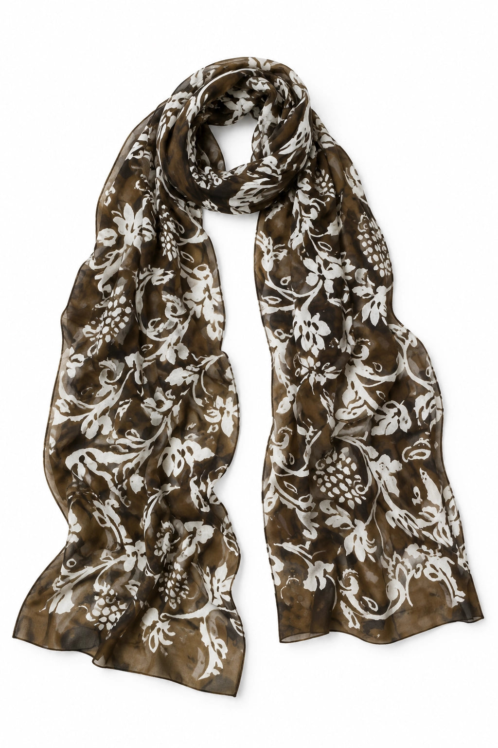A lightweight scarf with an intricate white floral and vine pattern over a brown base, arranged in a draped loop on a clean white background.