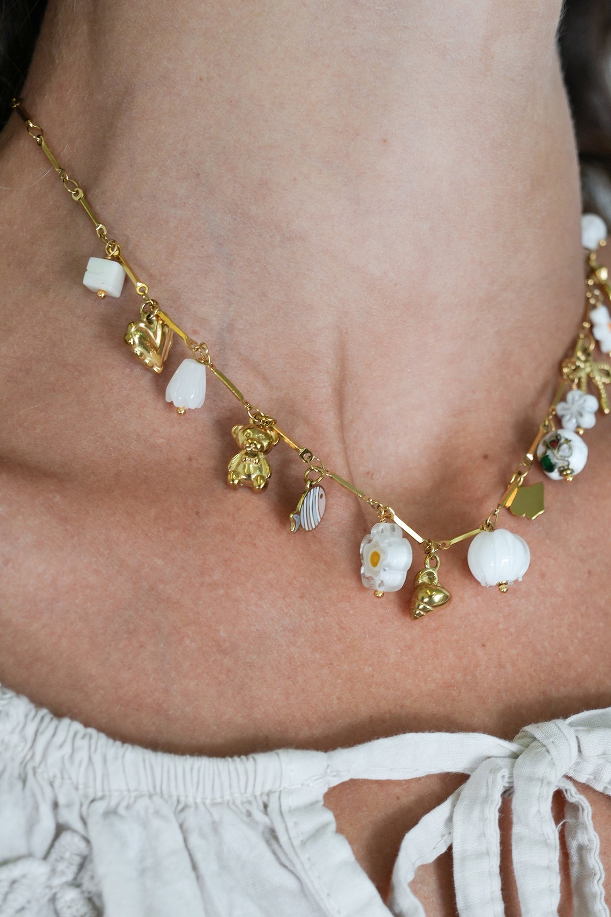 White Daisy Charm Necklace, necklace from Something Pretty, alternative view