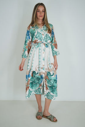 Woman wearing a floral dress with a white background