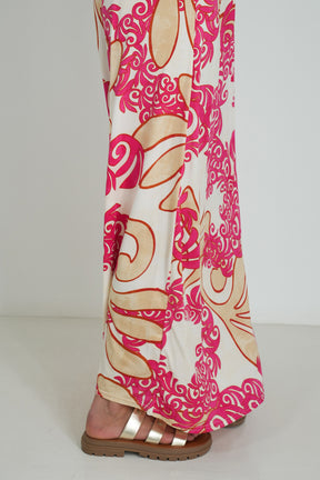 Pink and beige patterned dress on a white background