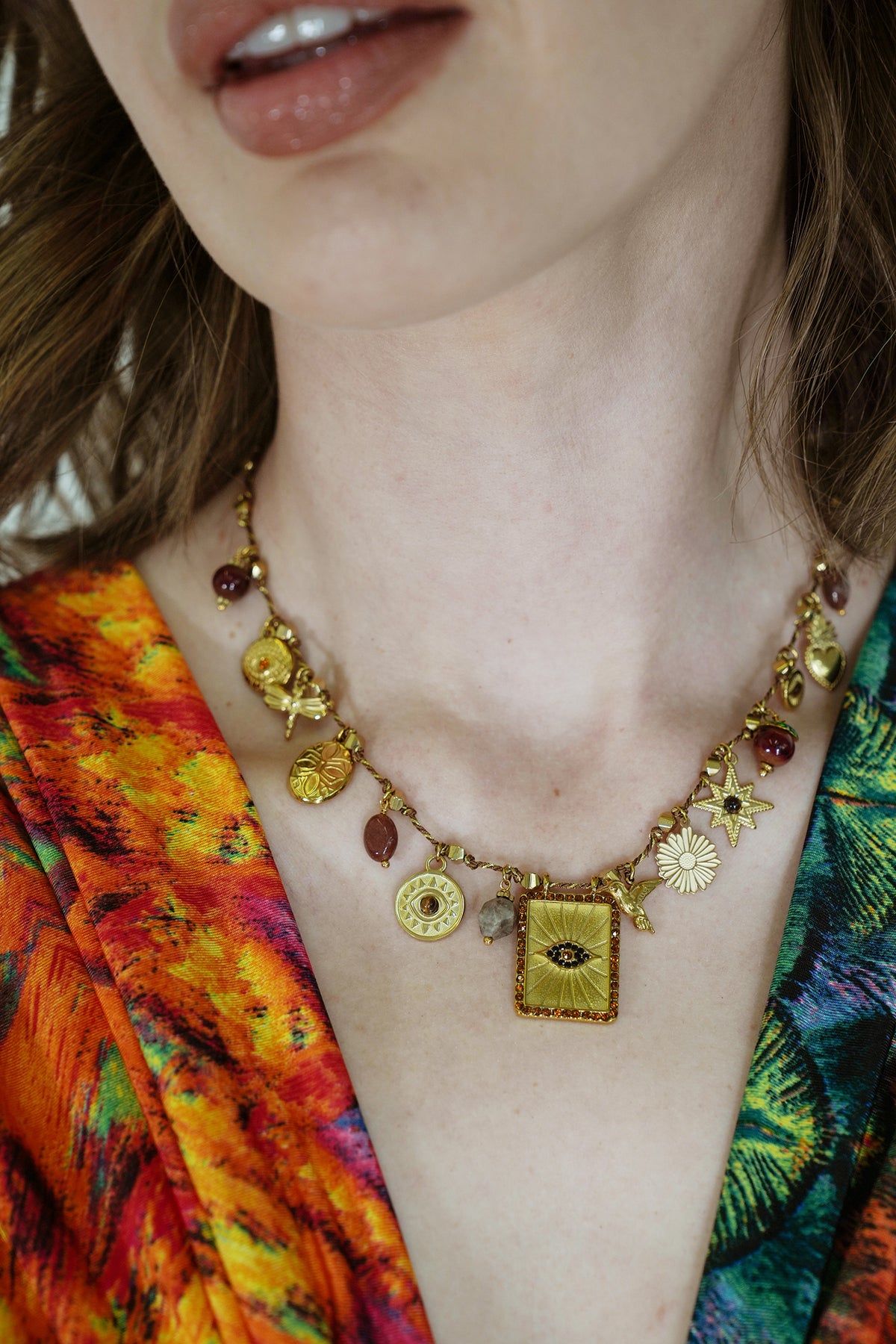 Gold and Rust Charm Necklace, a necklace from Something Pretty