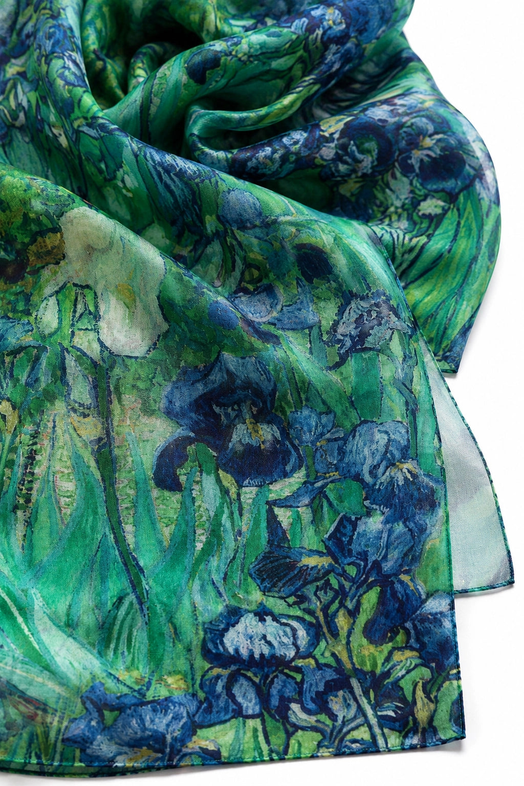 A lightweight square scarf featuring a vibrant green and blue floral print inspired by Van Gogh's Iris style, shown draped on a white background.