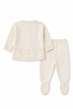 Baby outfit set with cardigan and pants on a white background