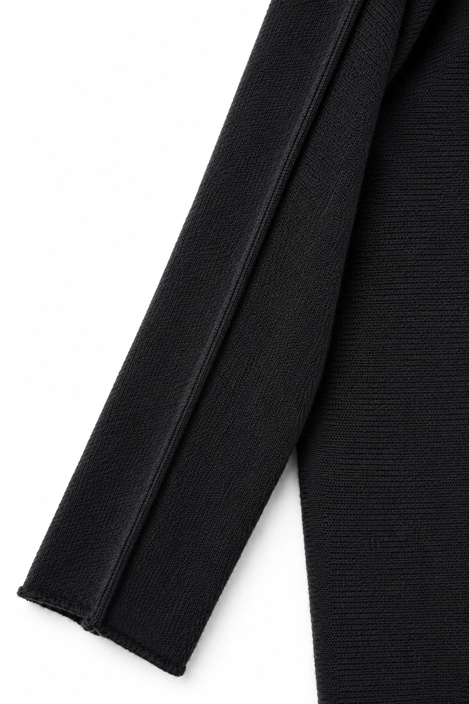 Close-up of a black fabric texture on a white background