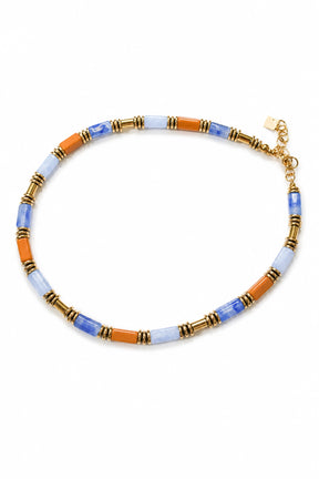 Necklace with multicolored beads on a white background