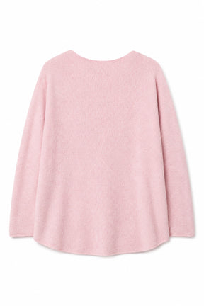 Pink poncho on a white background