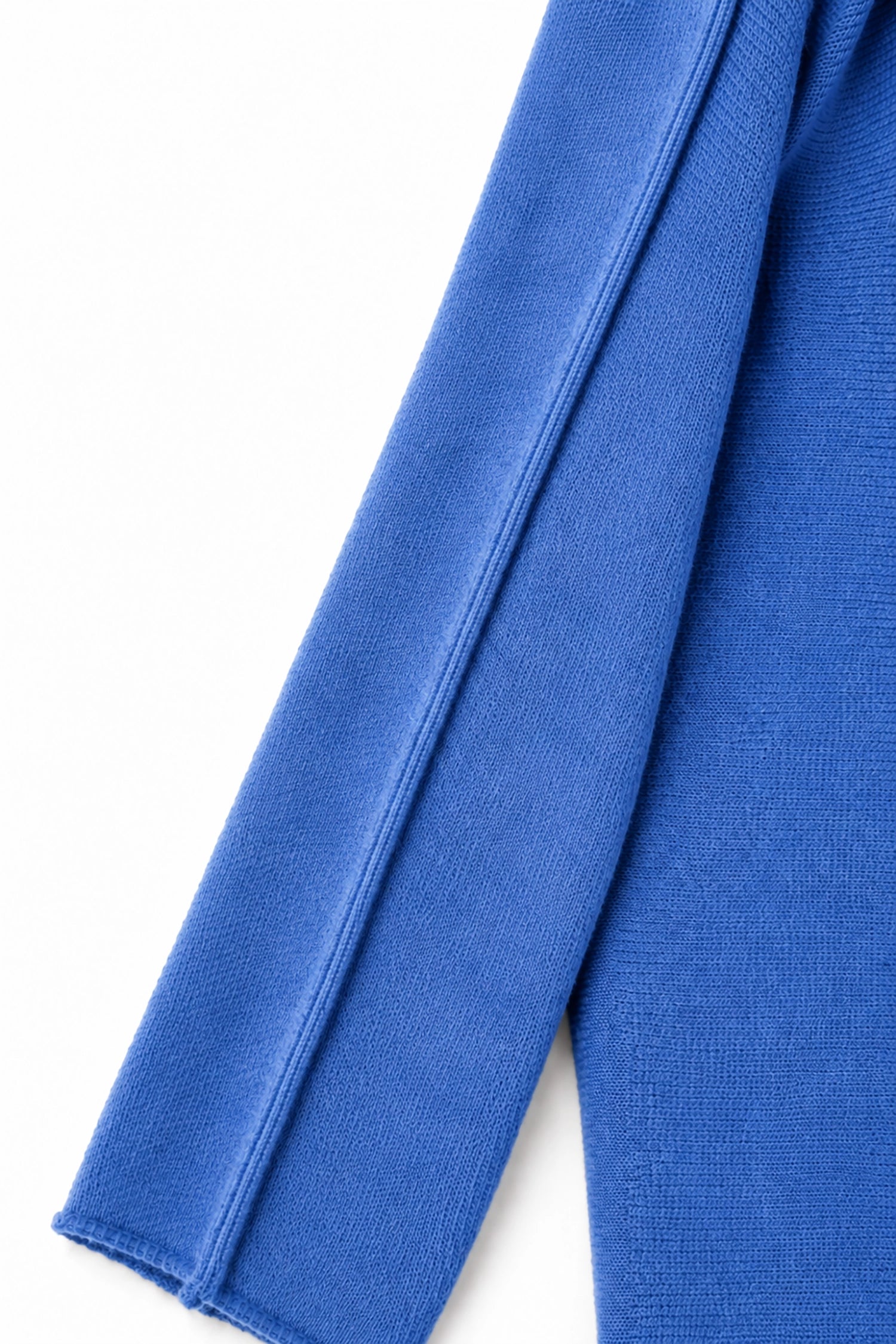 Close-up of blue fabric on a white background