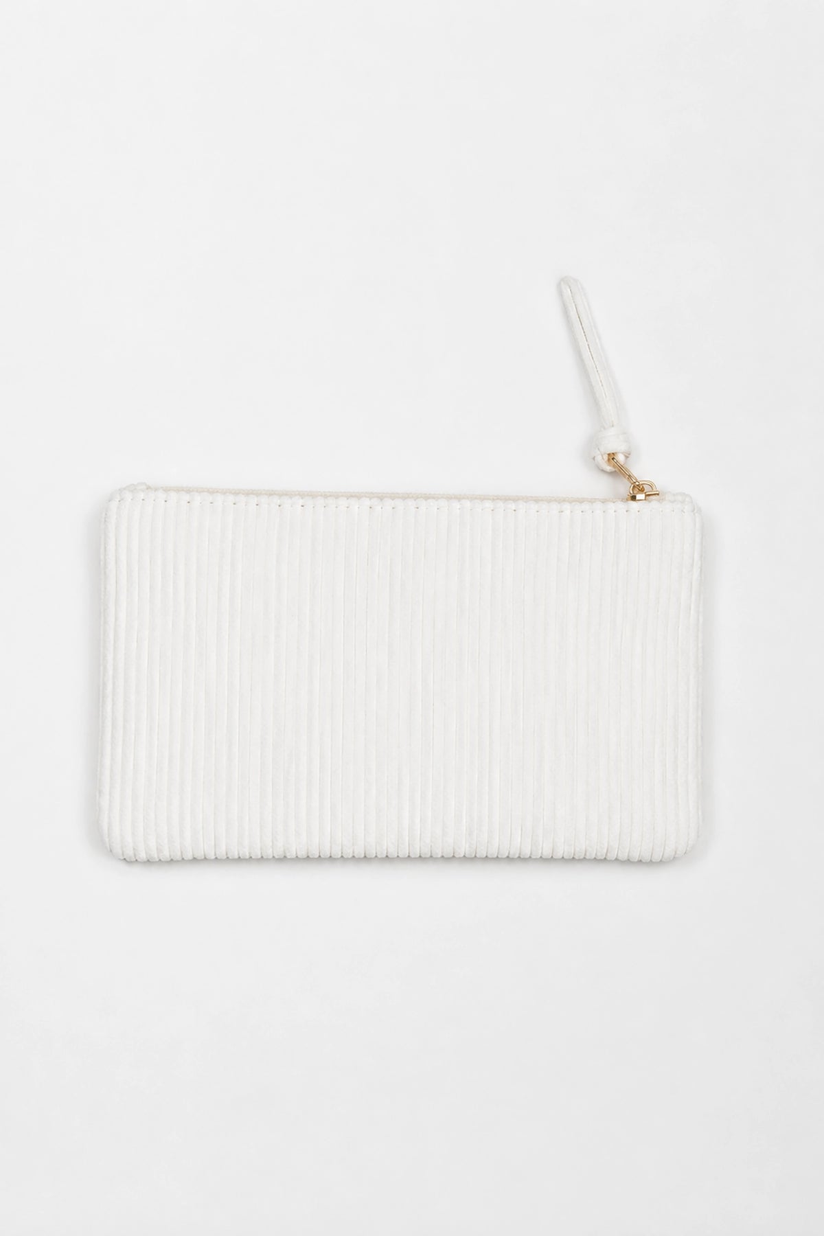 White ribbed clutch bag on a white background