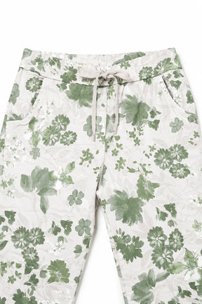 Floral-patterned pants on a white background